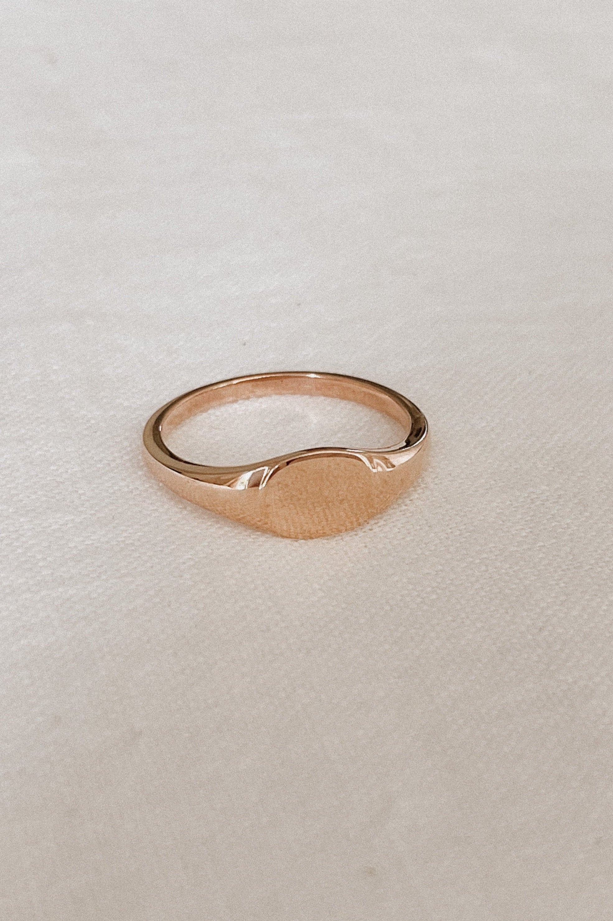 Rose gold signet ring in adult size.