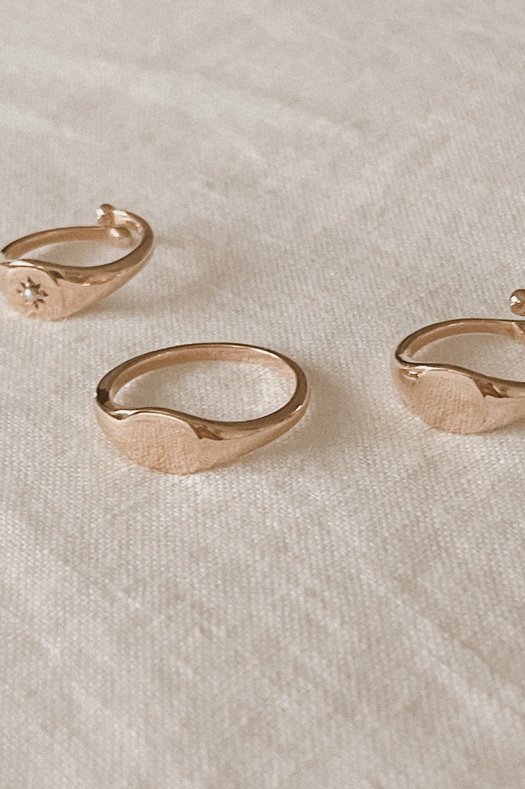 A solid 9ct Rose Gold signet ring in two different adult ring sizes.  Ethically made by fairtrade artisans.