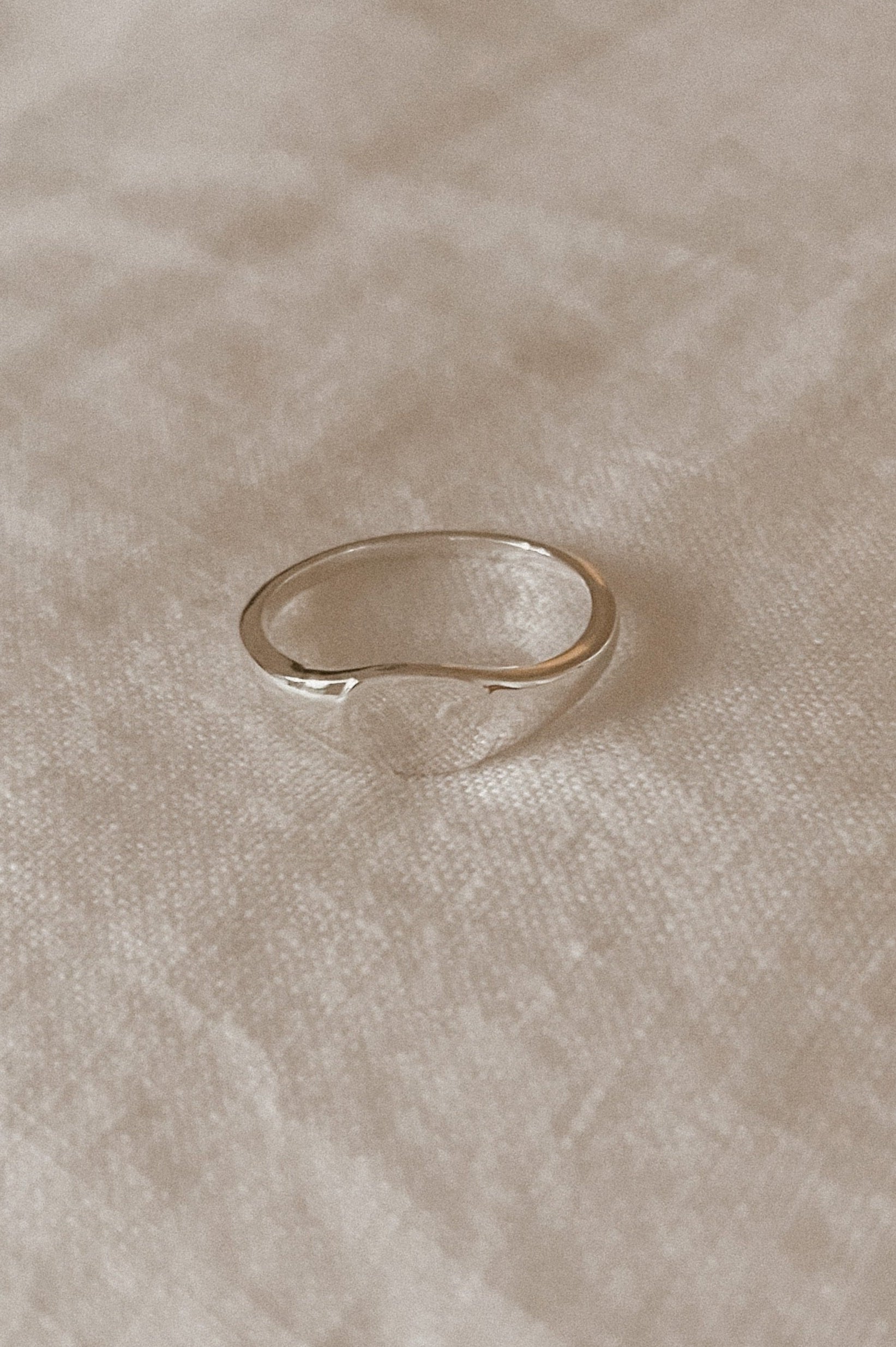 Sterling Silver signet ring in adult size.