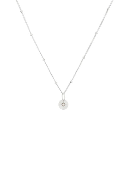 A vintage pearl necklace with a vintage inspired pendant with seed pearl in its centre.