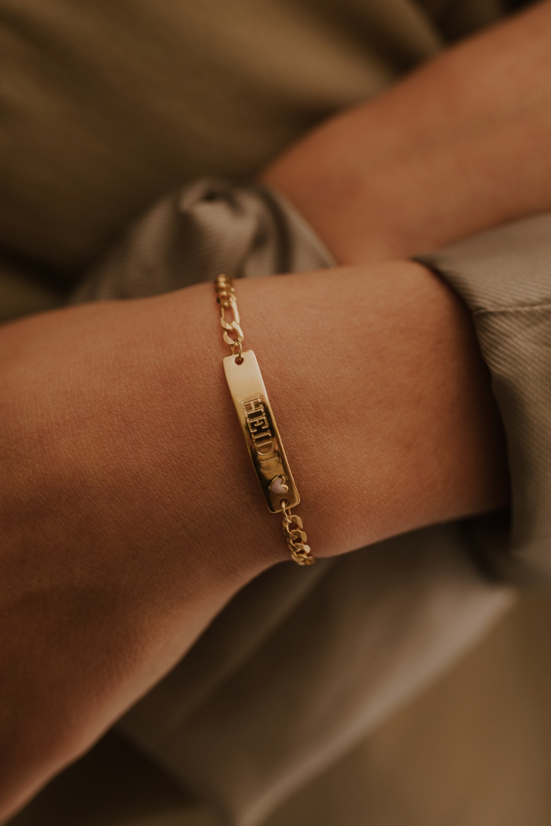 A close up look at a Pink Darling Bracelet in our child size with personalised name engraved on the front.  A gorgeous keepsake bracelet that is personalised and meaningful by Bluebird Jewellery