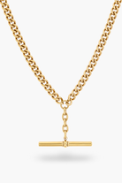 Gold chain necklace with a bar pendant on a white background.  The necklace features a bluebird co logo tag.