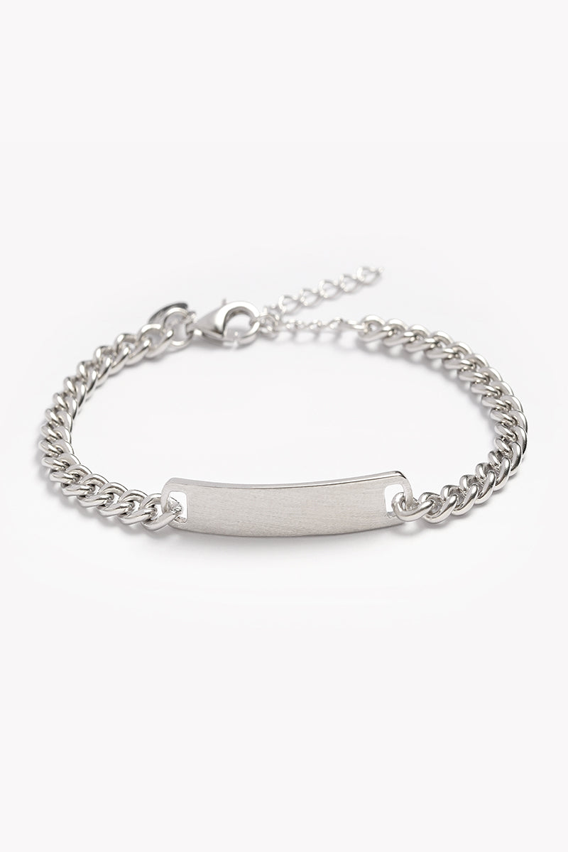 A solid sterlig silver ID bracelet for kids that has a brushed matte finish