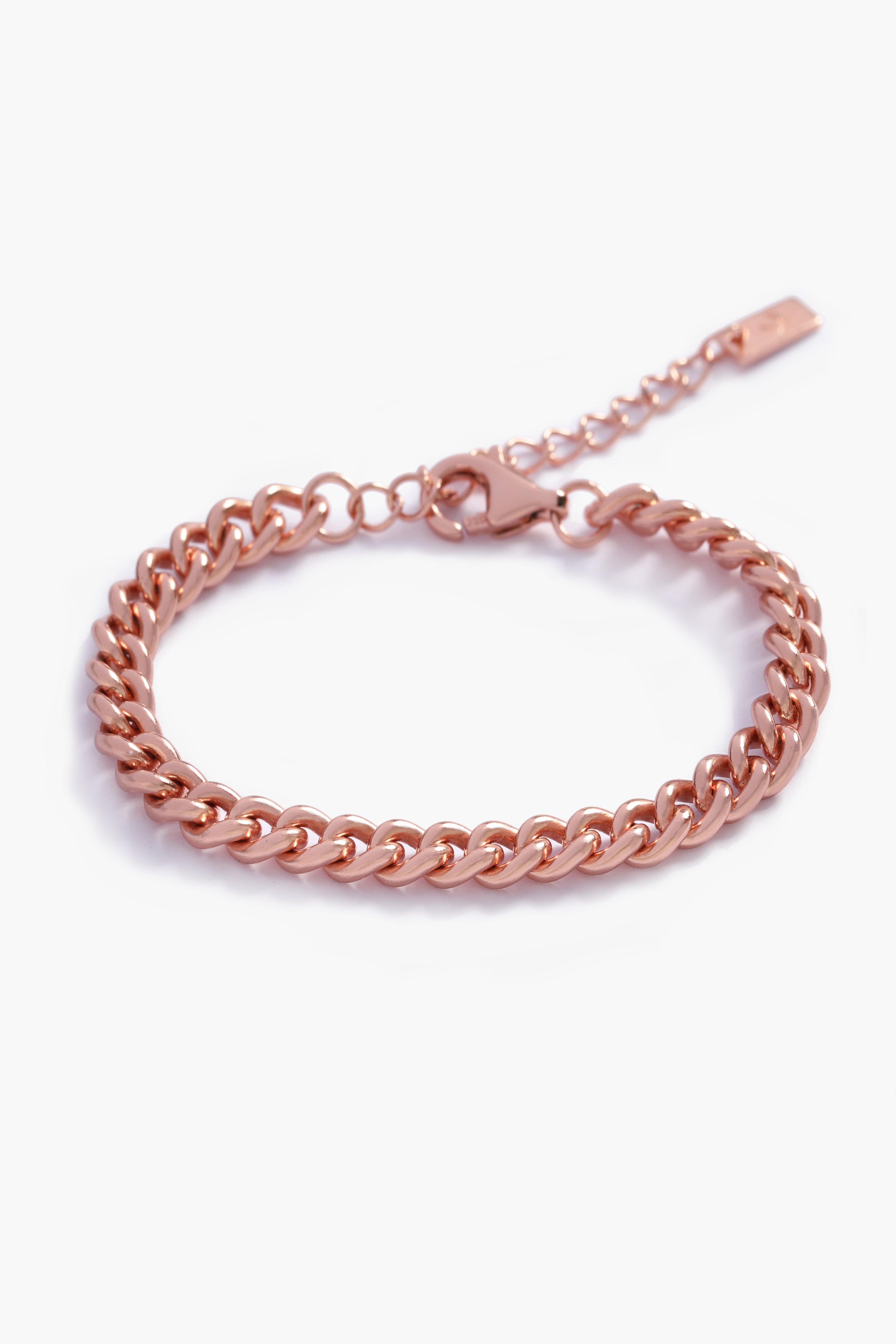 A rose gold bracelet beautifully displayed on a white background to highlight its craftsmanship by Bluebird Jewellery