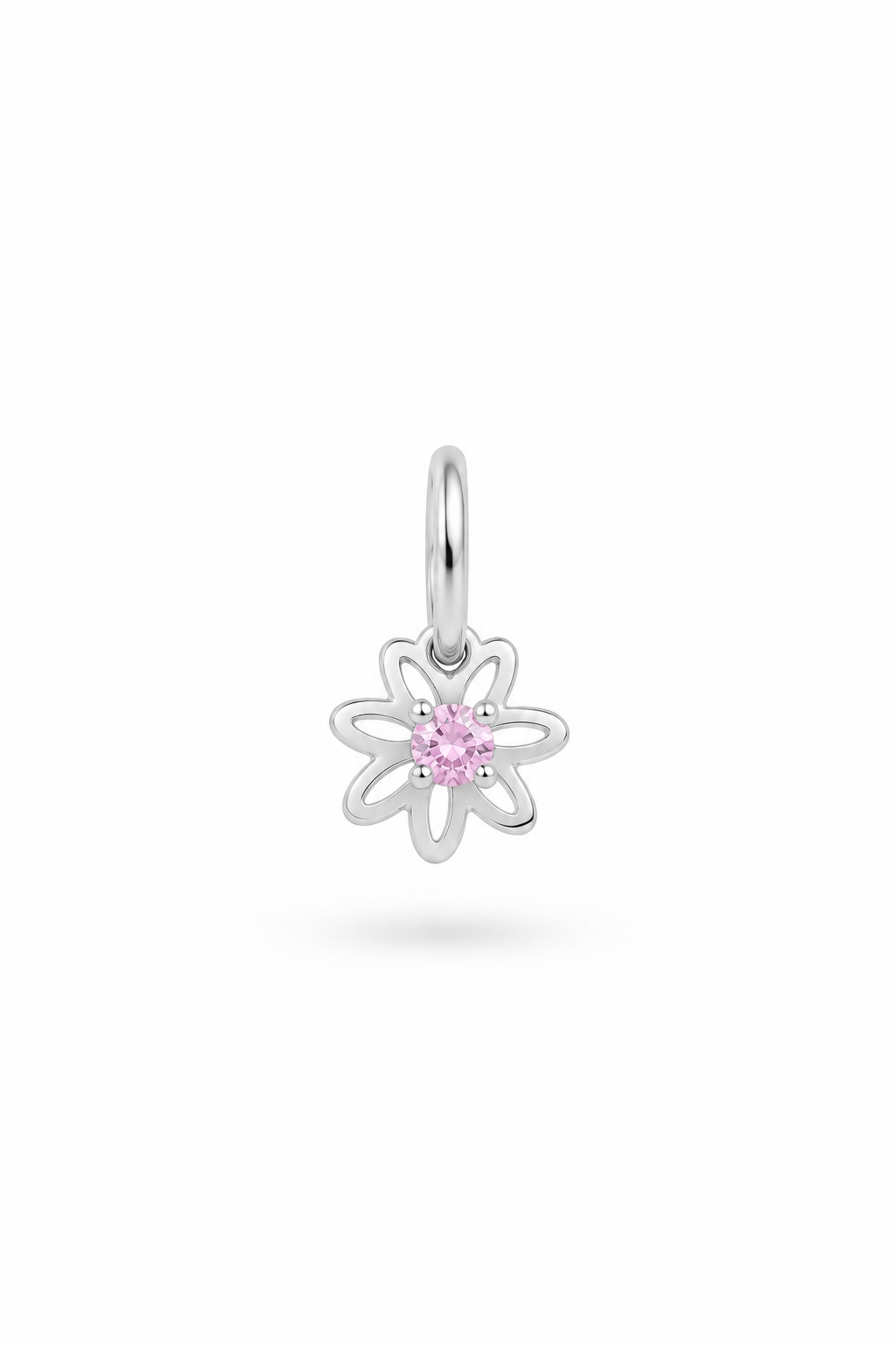 A silver flower-shaped charm pendant featuring a small pink gemstone in the center, suspended from a silver bail, shown against a plain white background.