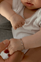 Darling Posie Silver bracelet with pink heart charm