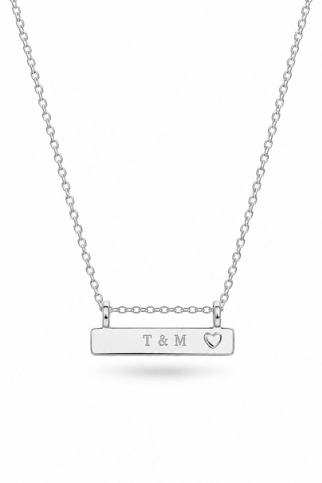 A silver bar necklace with engraving