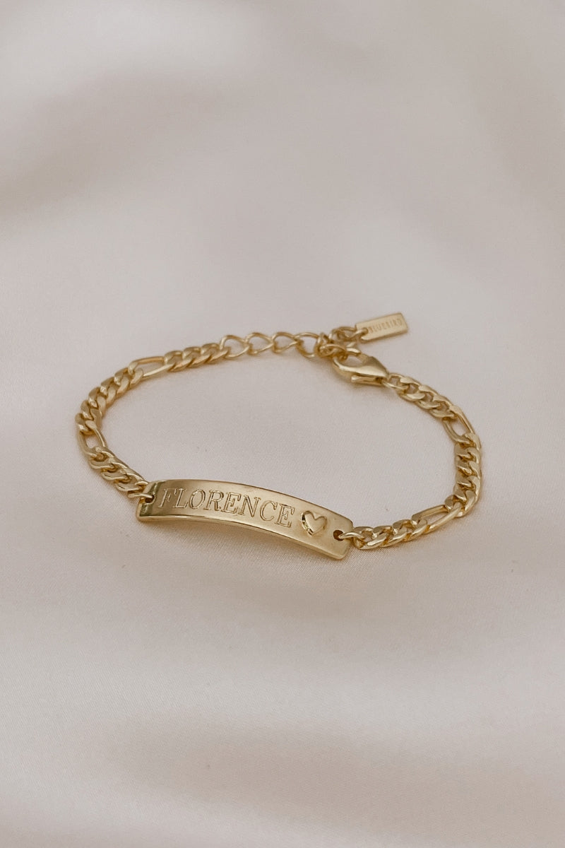 A Darling Bracelet with the name 'FLORENCE' engraved on the front of the personalised ID bracelet.