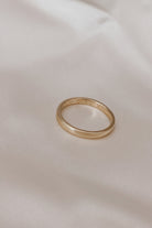 A Signature Pinky Ring with the words 'MY GIRL ZIMI' engraved inside of it.