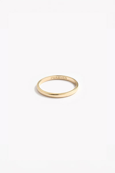A Signature Pinky Ring with the word 'FOREVER' engraved inside of it.