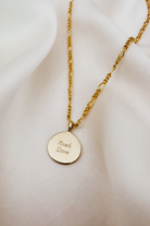A close-up image of the Soléil Pendant – 9ct Gold with chain, featuring a radiant round design and complimentary engraving for a truly personal touch.