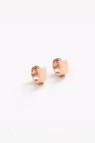 Petite Signature Huggies in Rose Gold.