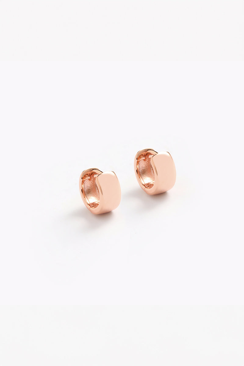 Petite Signature Huggies in Rose Gold.