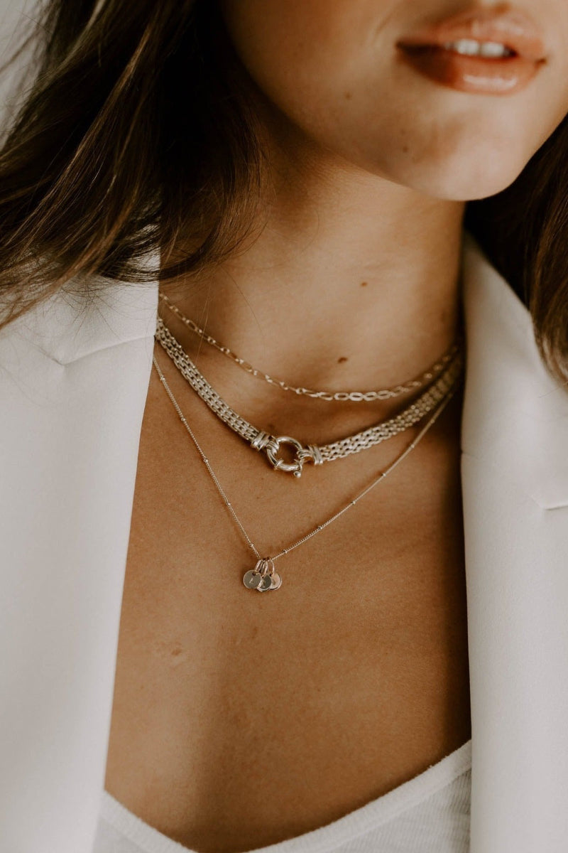 The 45cm ball chain necklace is worn as the longest necklace in this layered necklace look. 