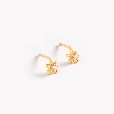 Gold Petite Daisy Erarings with an organic flower shape and fine cubic zirconia stones set in their center.