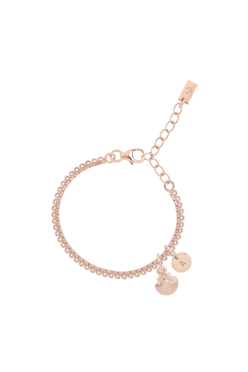 A delicate Lace Chain Bracelet featuring a gold mermaid shell charm and solid rose gold initial pendant, crafted in fine jewellery style for a coastal-inspired look by Bluebird Jewellery