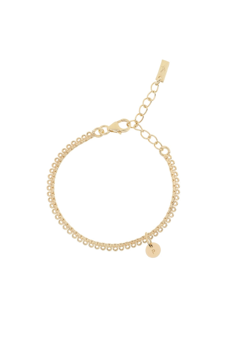 A personalised Lace Chain anklet featuring an engraved initial pendant, designed as an elegant fine jewellery gift for all ages.