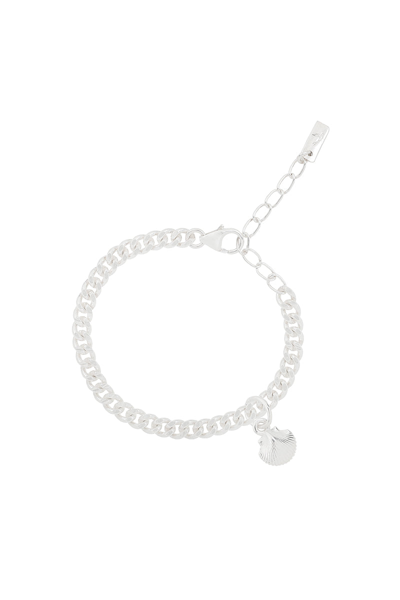 A delicate silver Cuban Link Chain Bracelet with a mermaid shell charm, designed as a timeless keepsake piece