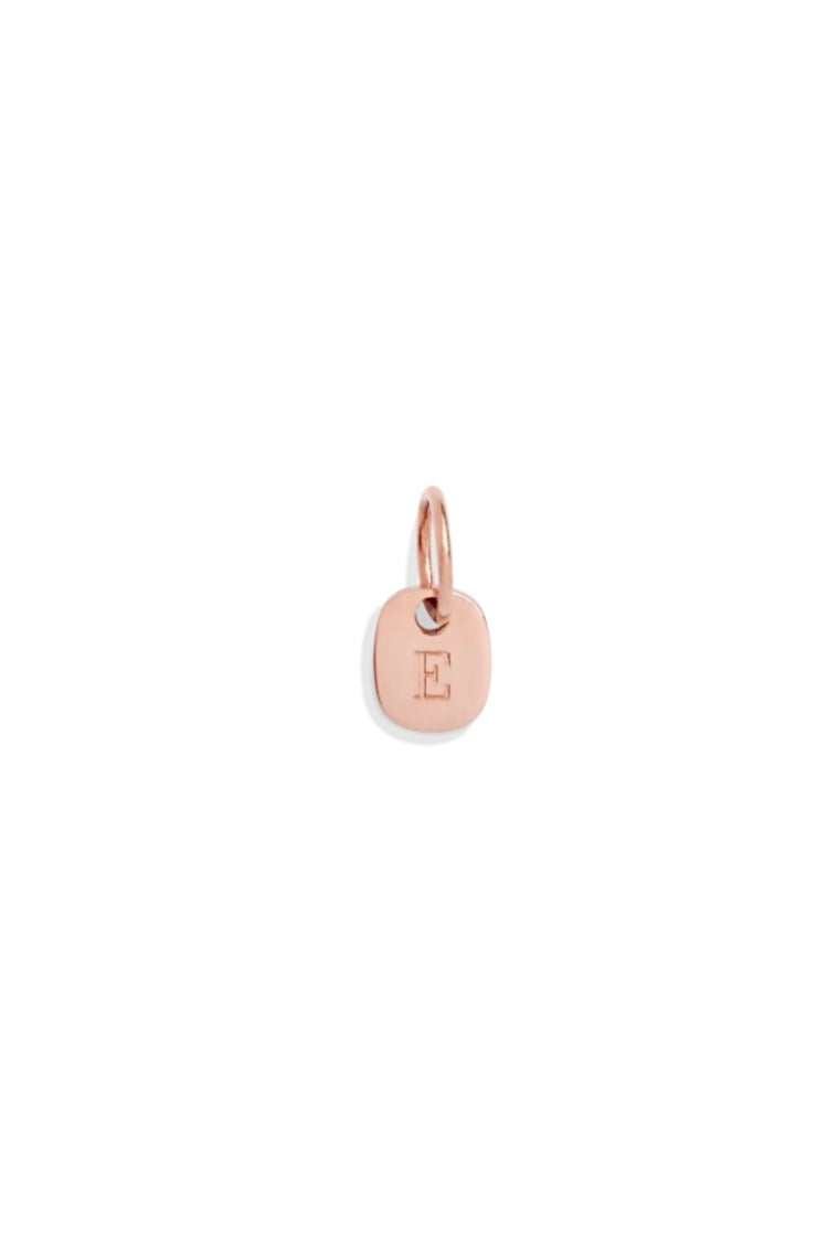 The Mini Rectangular Pendant by Bluebird Jewellery features gentle curves and a luxe, modern silhouette. Personalised with your chosen letter, it embodies feminine elegance and can be worn beautifully on any necklace, bracelet, or anklet chain.