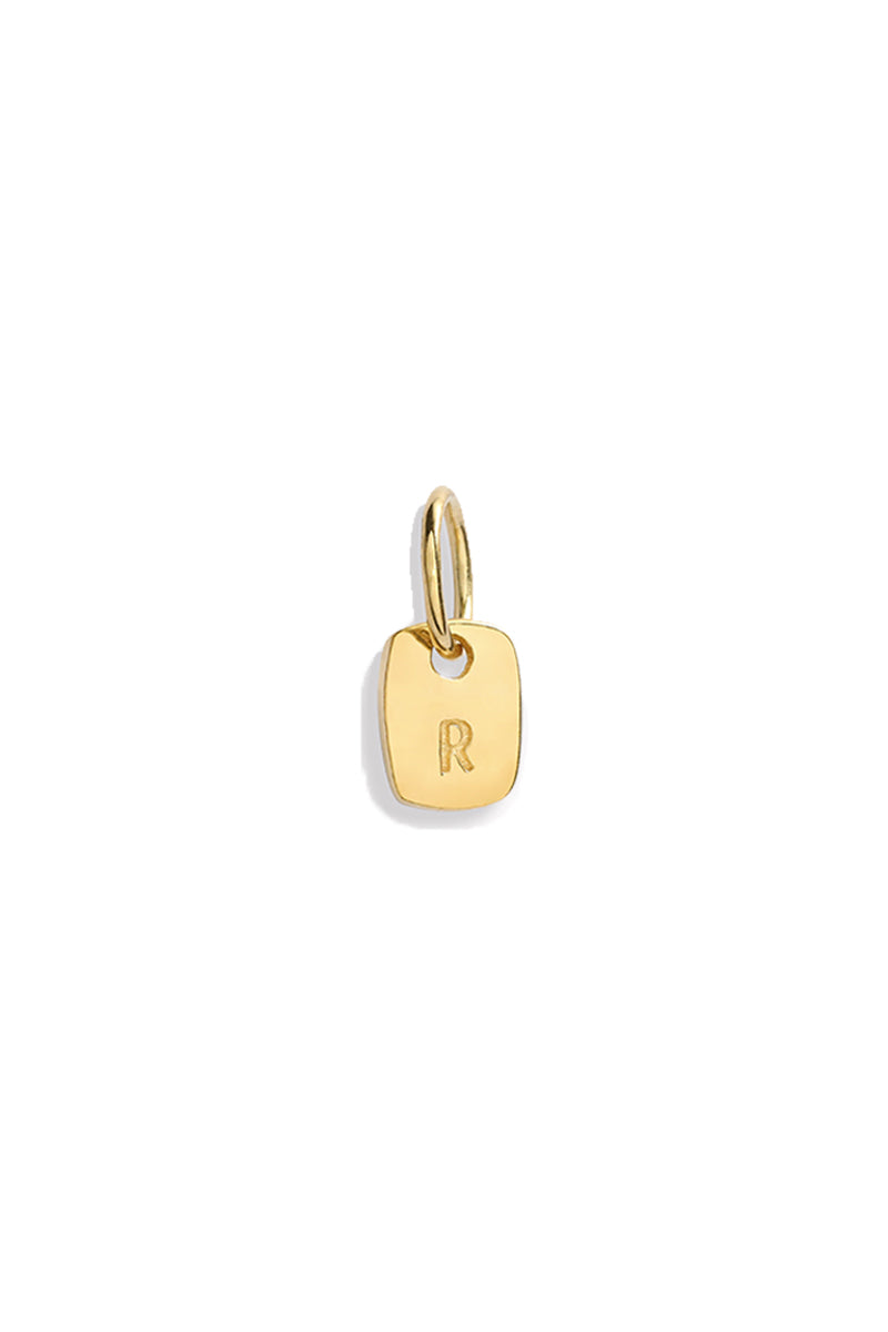 The Mini Rectangular Pendant by Bluebird Jewellery features gentle curves and a luxe, modern silhouette. Personalised with your chosen letter, it embodies feminine elegance and can be worn beautifully on any necklace, bracelet, or anklet chain.