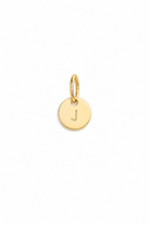 A classic round Petite Gold Vermeil Initial Pendant from Bluebird Jewellery, personalised with your chosen letter and designed to be worn elegantly on any necklace, bracelet, or anklet chain.