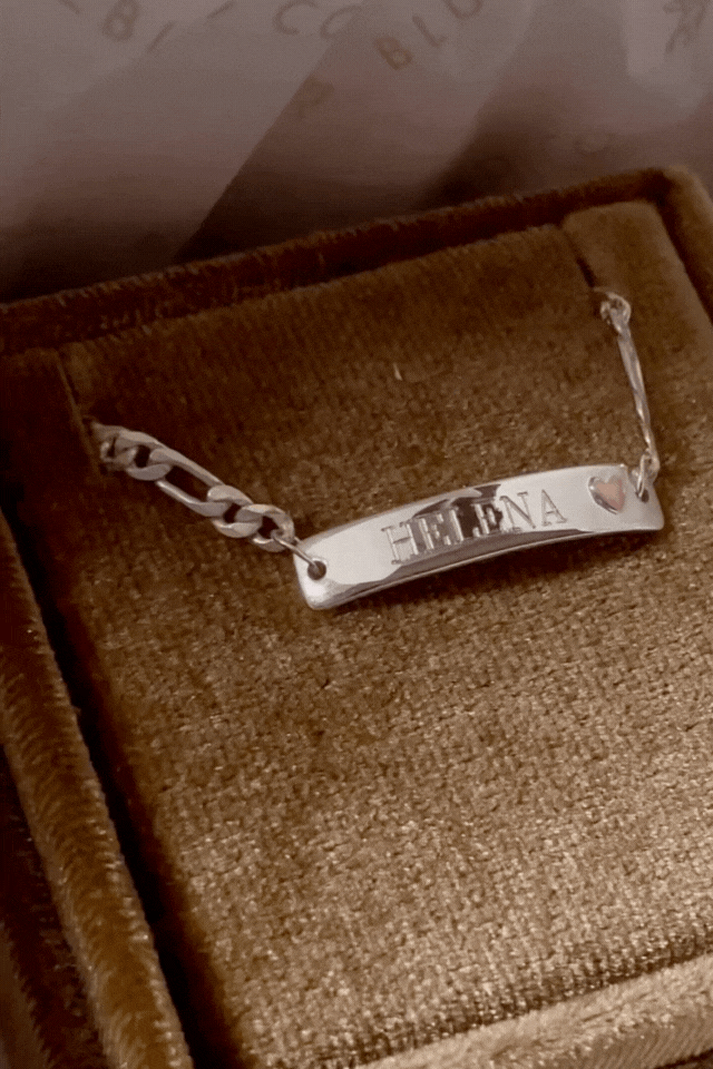 Bluebird Co engraved Pink Darling bracelet in silver, packaged in velvet box. 