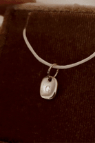 Bluebird co's rectangular initial pendant 