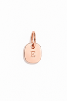 A rectamgular initial pendant made from solid 9ct Rose Gold and machine engraved with letter in the centre of the pendant