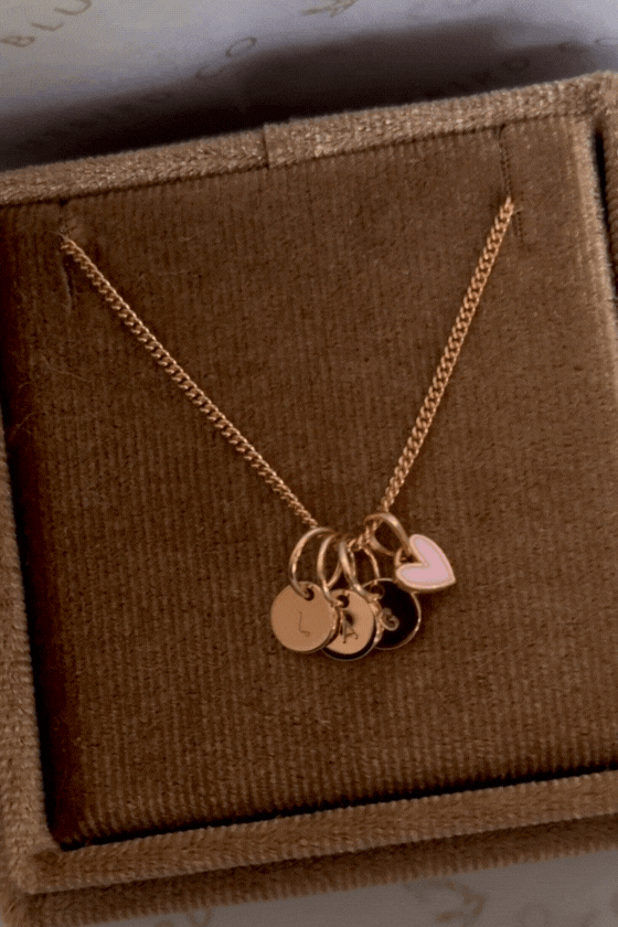 Bluebird Co's rose gold initial pendants with mini pink sweetheart pendants 