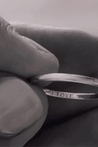 Bluebird Co's signature pinky ring with engravement