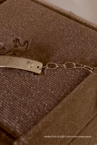 Video showing engraving on a solid gold darling bracelet 