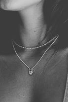 A modern yet timeless piece, the Rectangular Pendant by Bluebird Jewellery features soft, graceful curves and a minimalist design. Personalised with your chosen letter, it adds a touch of refined femininity to any necklace, bracelet, or anklet chain.