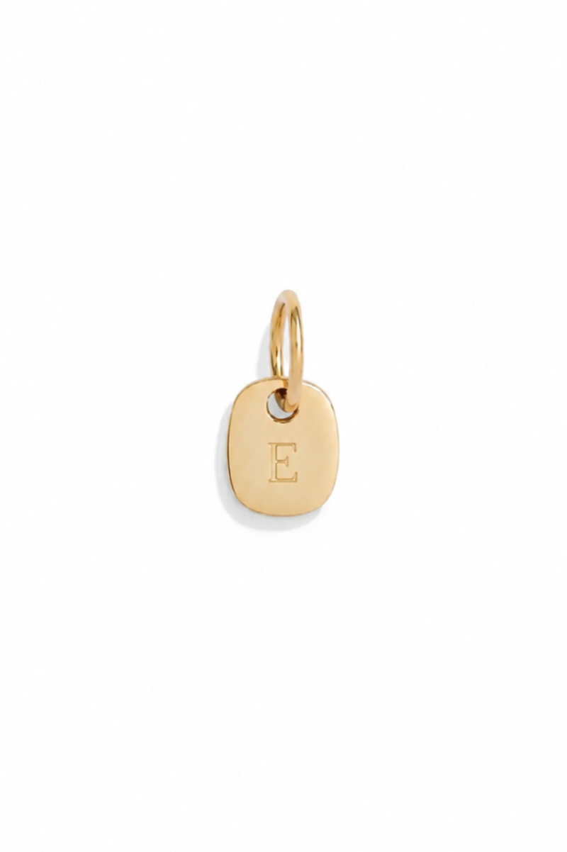 A refined and feminine design, the Rectangular Pendant by Bluebird Jewellery showcases soft curves and a modern minimalist form.  A rectangular initial pendant made from solid 9ct gold that is designed to be worn on any necklace chain. Can have personalised initial engraved on the front of the letter pendant.