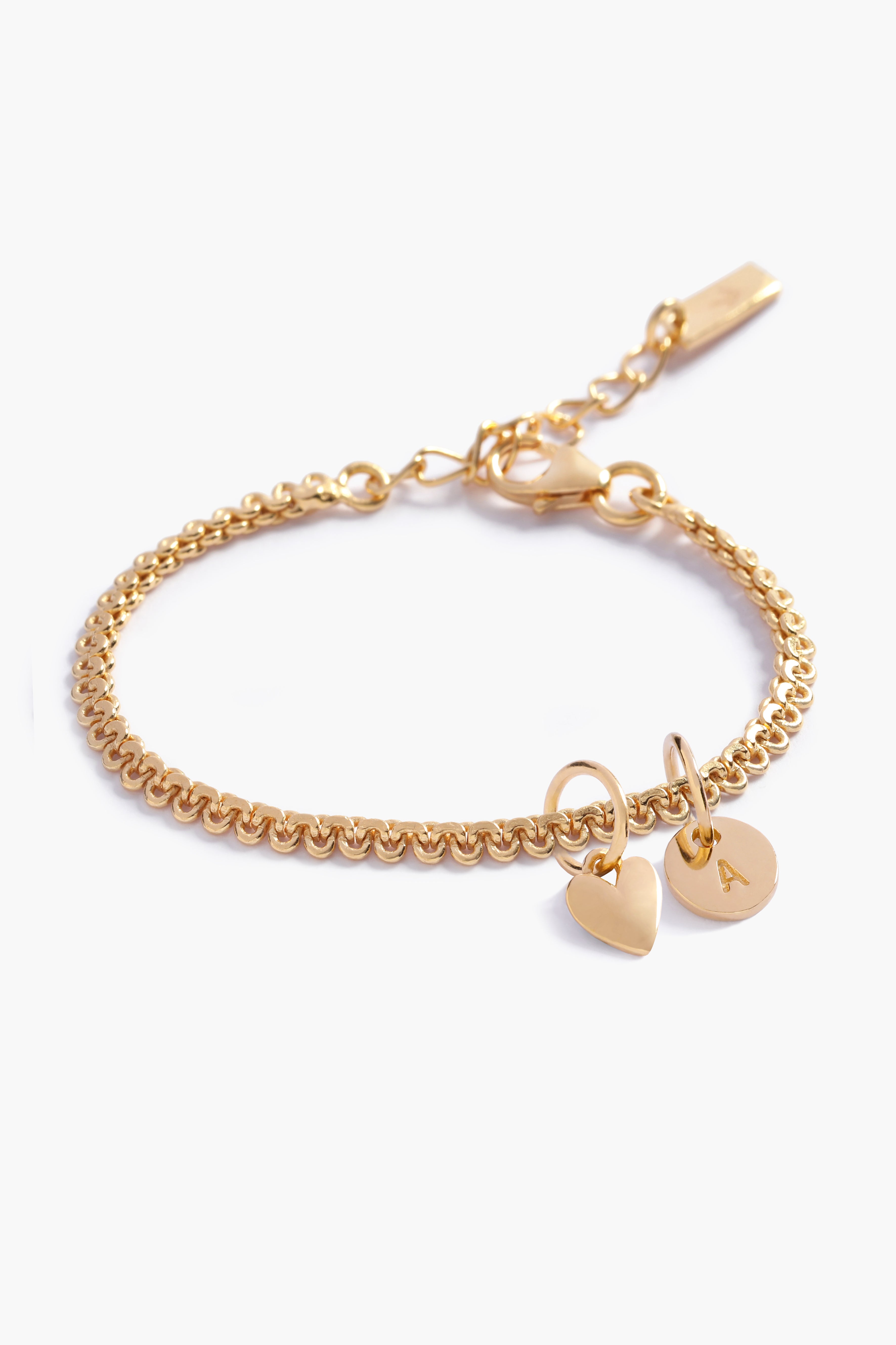 A personalised Lace Chain Bracelet featuring a heart charm and initial pendant, designed as an elegant fine jewellery gift for all ages.