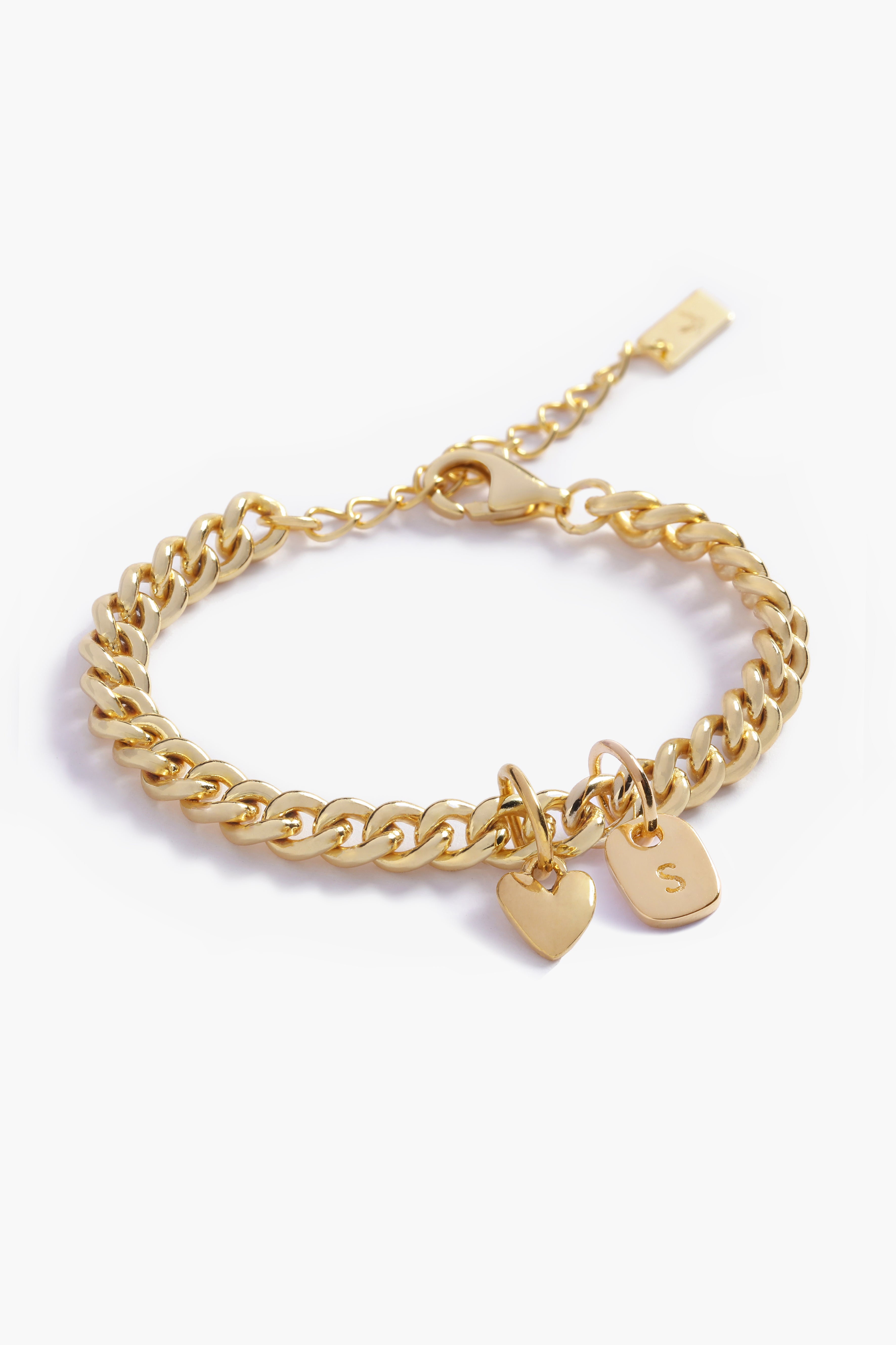 Gold chain bracelet with heart-shaped tag and round tag on a white background