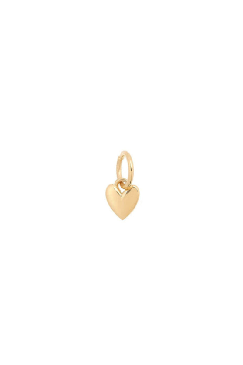 A gold heart-shaped pendant on a plain background.