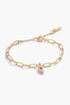 Darling Posie Bracelet with pink heart charm on gold chain, a baby keepsake bracelet