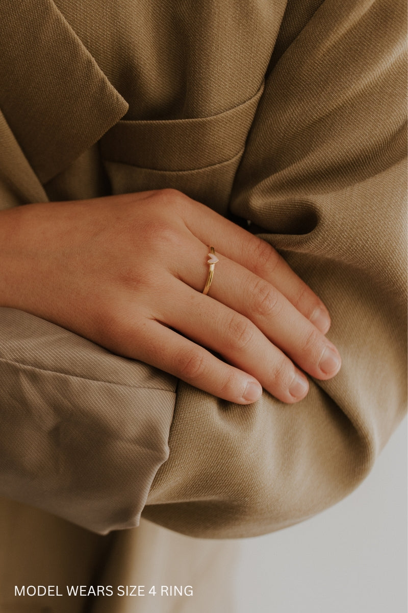 Darling Ring Gold worn on finger, pink engraved heart centre