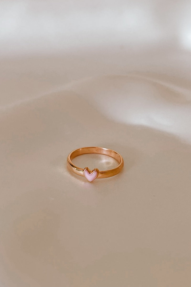 Side angle of Darling Ring Rose Gold with a pink enamel heart.
