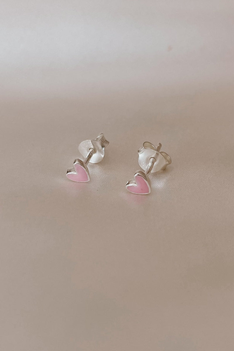 Darling Silver Earrings featuring pink heart design photographed side by side