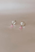 Darling Silver Earrings featuring pink heart design photographed side by side