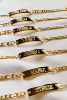 Row of Pink Darling Gold name bracelets with pink hearts—personalised jewellery for siblings, cousins, or best friends.