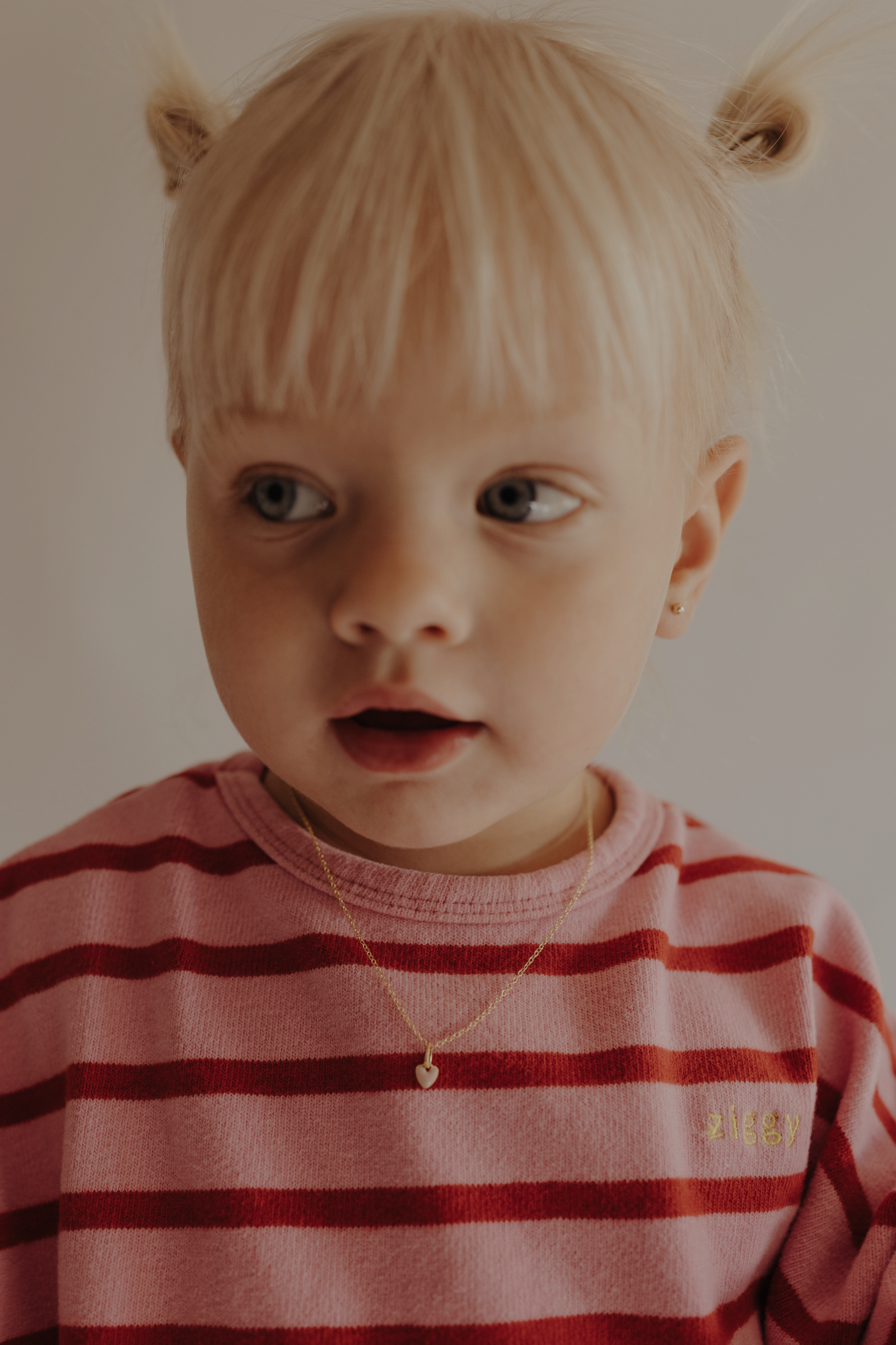 Toddler wearing pink petite Darling Necklace Gold 