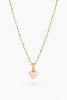 A petite necklace designed for children and adults that features a soft pink heart pendant alongside optional initial pendant/s