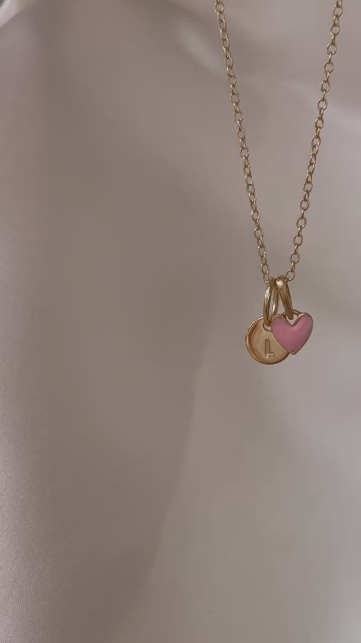 A close up video of the Pink Petite Darling Necklace with a Gold Vermeil Initial Pendant