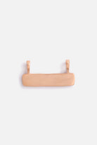 Back view of Signature Bar Necklace pendant in rose gold. Smooth finish with subtle maker’s mark engraved.