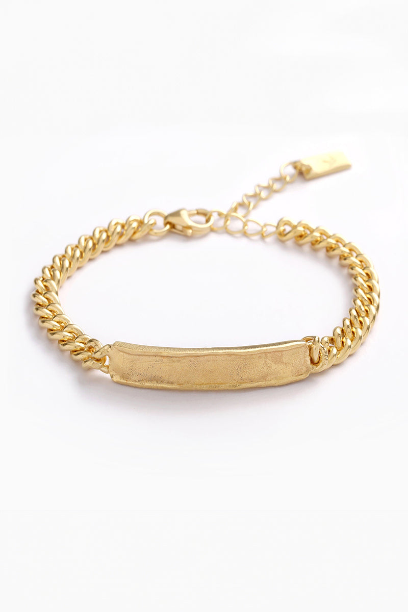 Engraved gold bracelet with curb chain, a meaningful personalised keepsake for adults and children by Bluebird Jewellery.