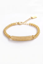 Engraved gold bracelet with curb chain, a meaningful personalised keepsake for adults and children.