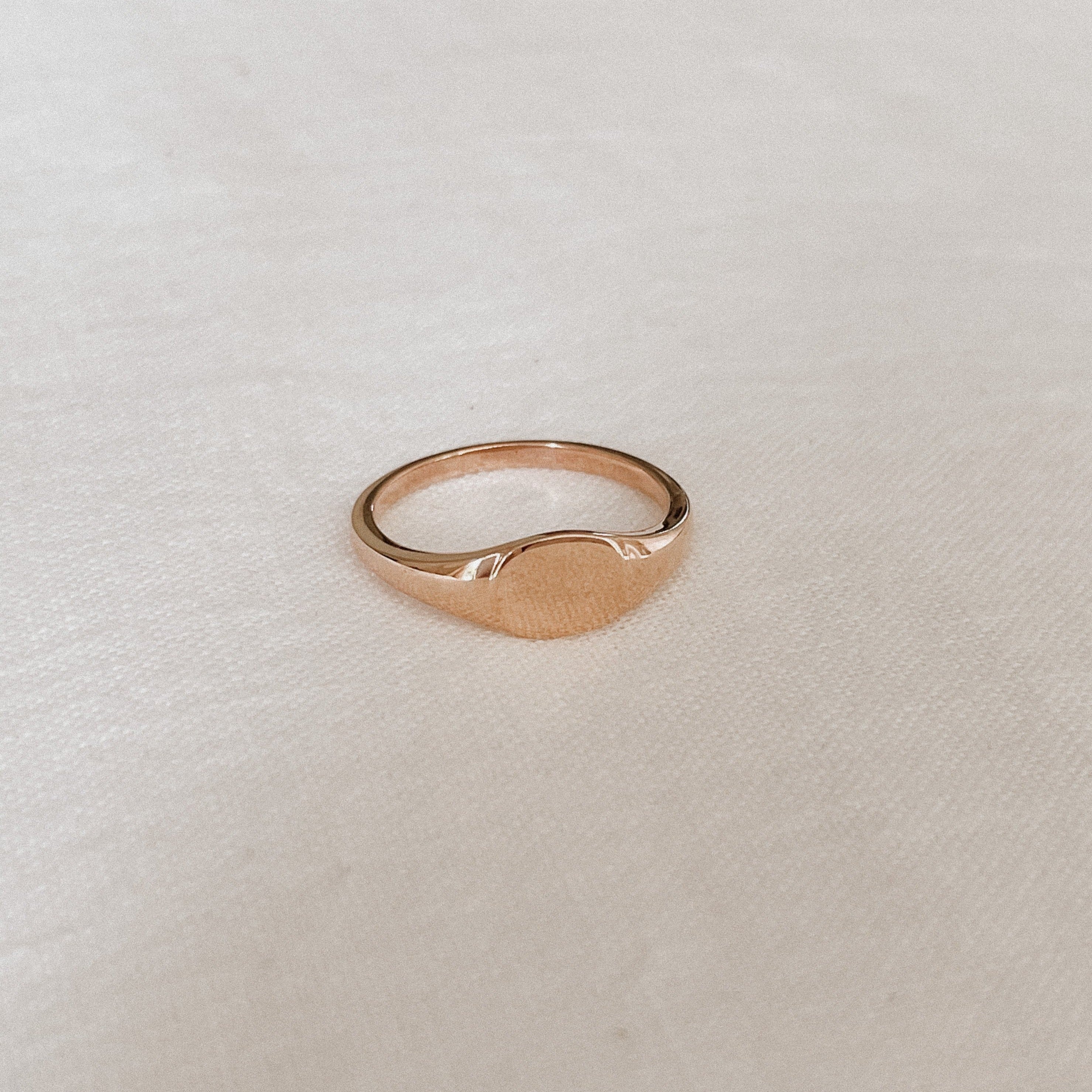 Rose gold signet ring in adult size.