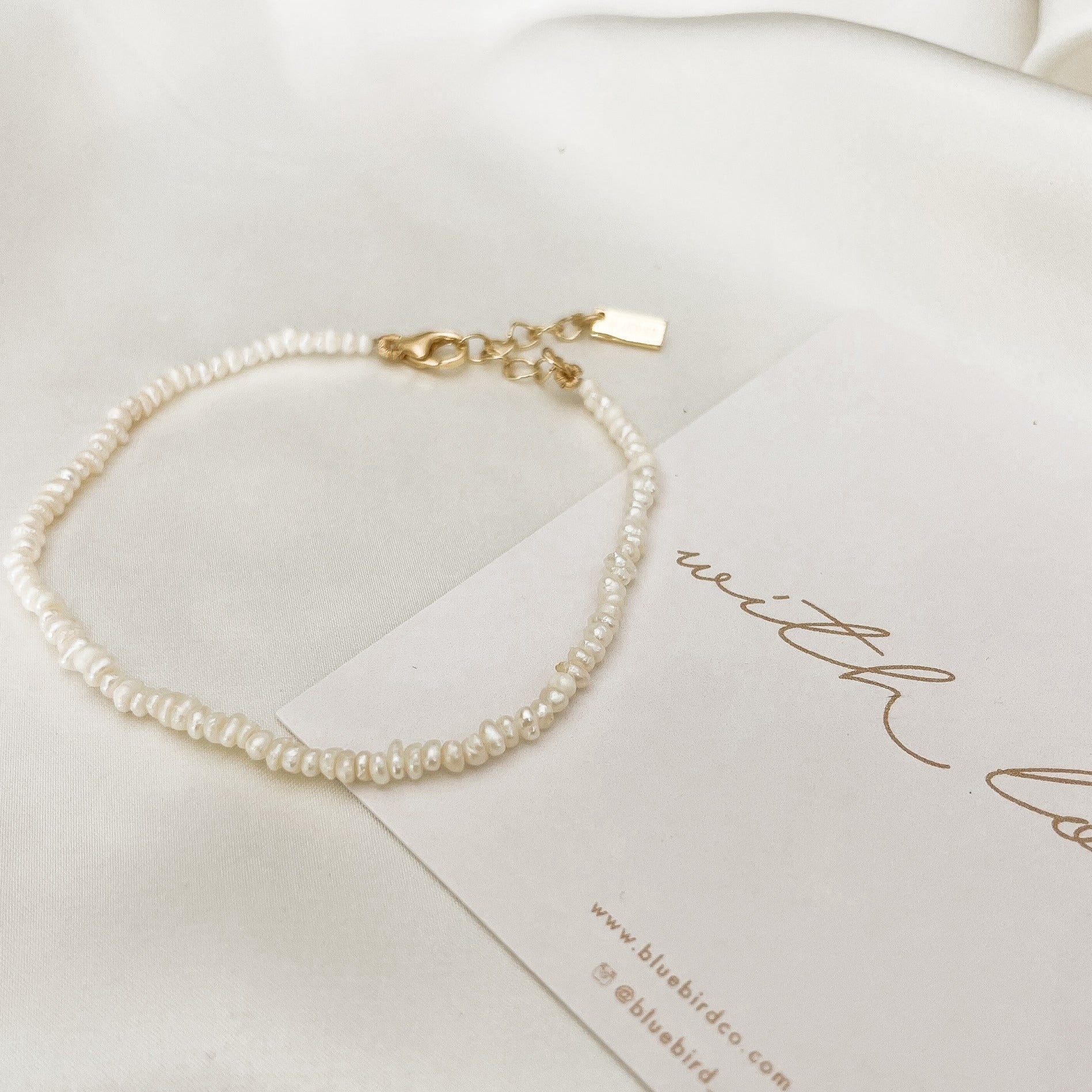 A freshwater pearl bracelet in adult length.